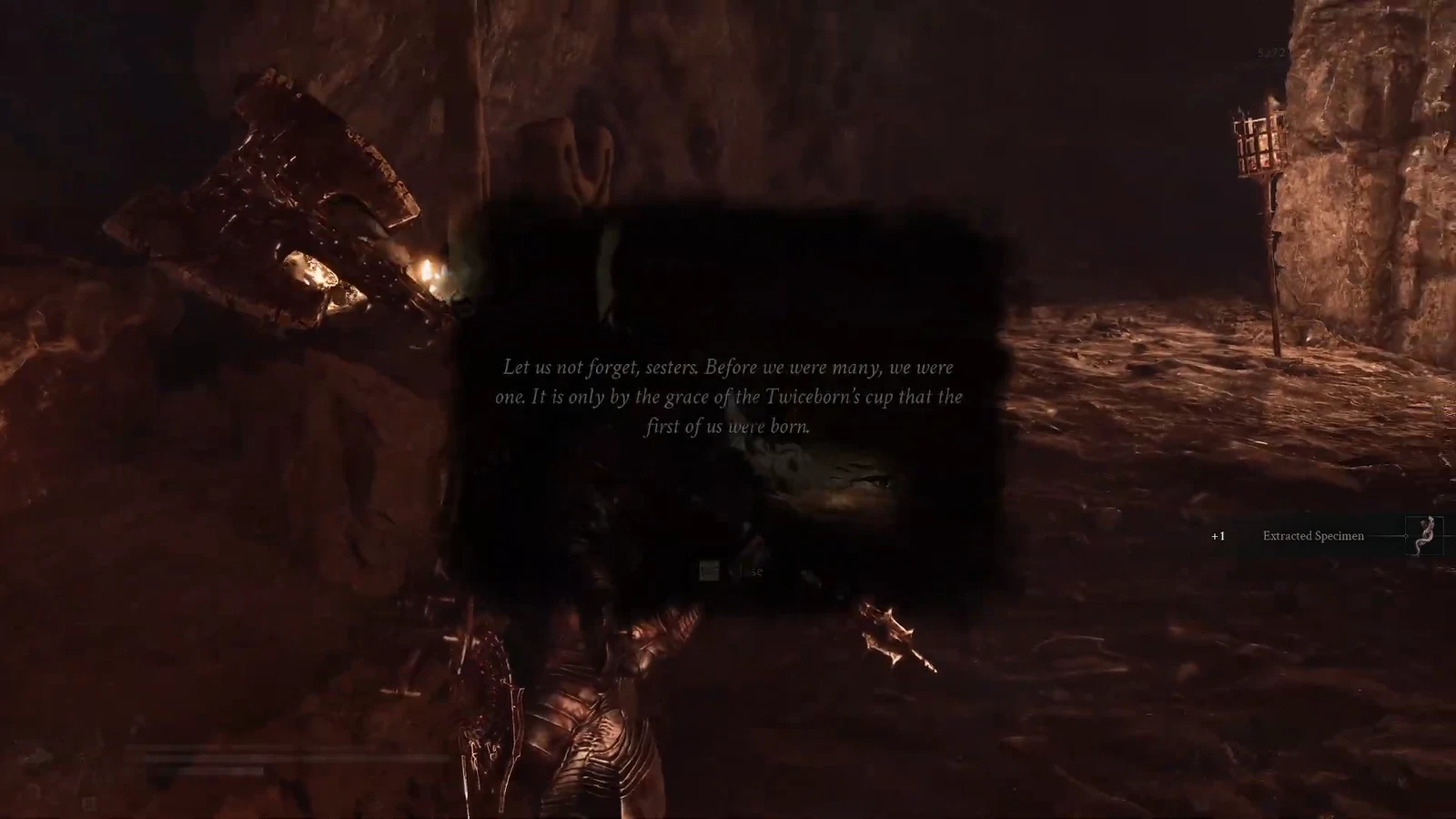 Centered lore message on screen after reading a gravestone engraving in the cavern