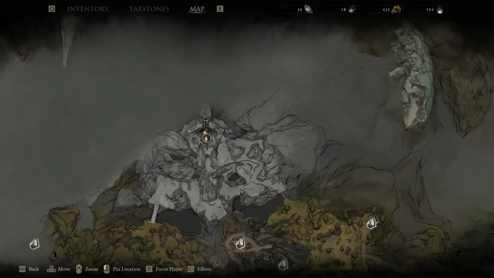 Open map screen with the player location marker centered on the surrounding cavern area