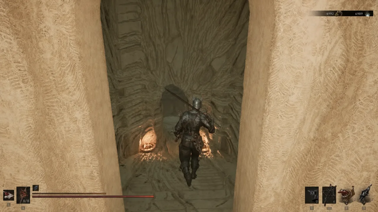 Character advancing through a tight cavern passage inside the uncleansed beacon