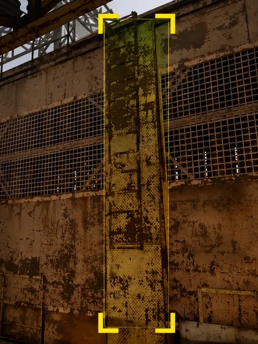 First-person view of a rusted steel support beam on the industrial climbing route above Nitro