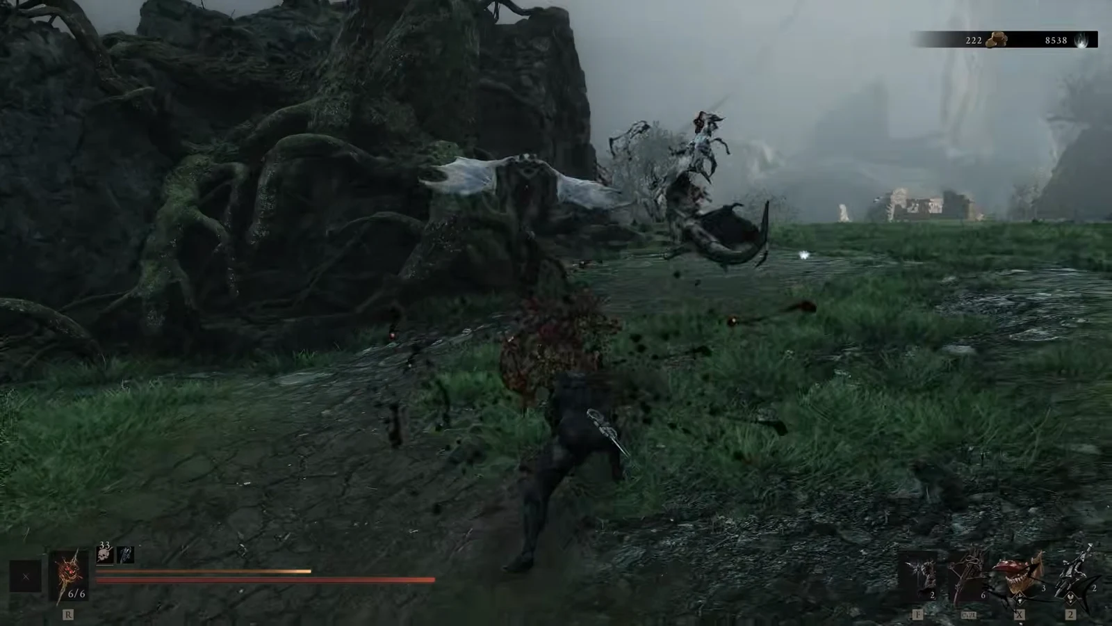 Player fighting a winged skeletal enemy in a grassy, root-covered outdoor area