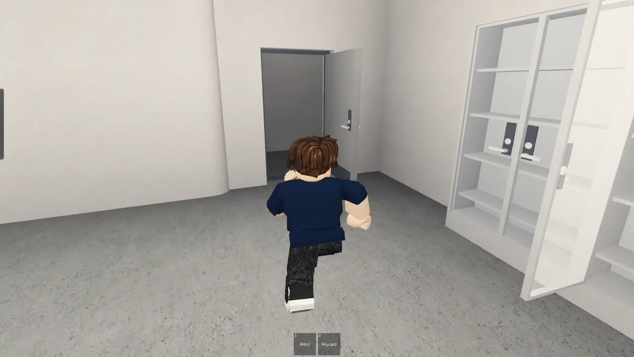 Player approaching an open bunker doorway with the M4A1 and Keycard items visible in the hotbar