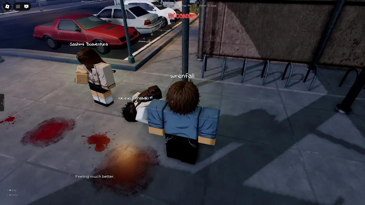 Gakuran player carrying a knocked-down character with the V Carry prompt showing