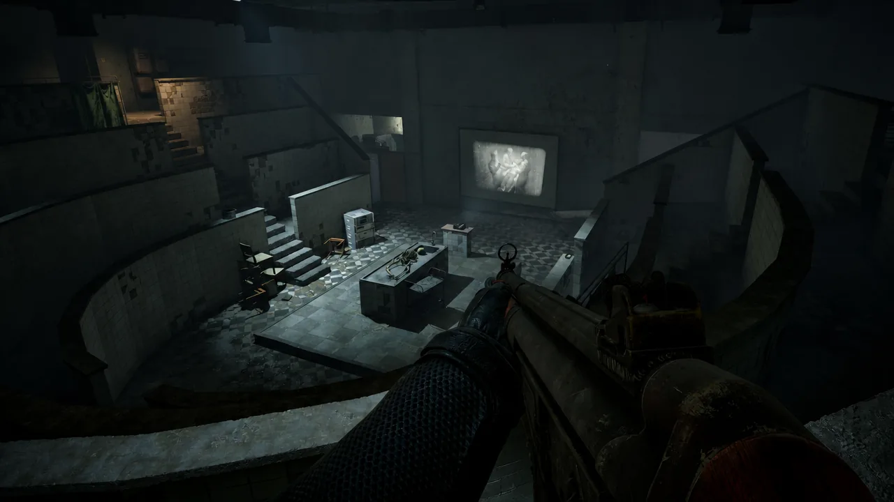 Rifle aimed across a tiled underground room with a projector screen and workbench