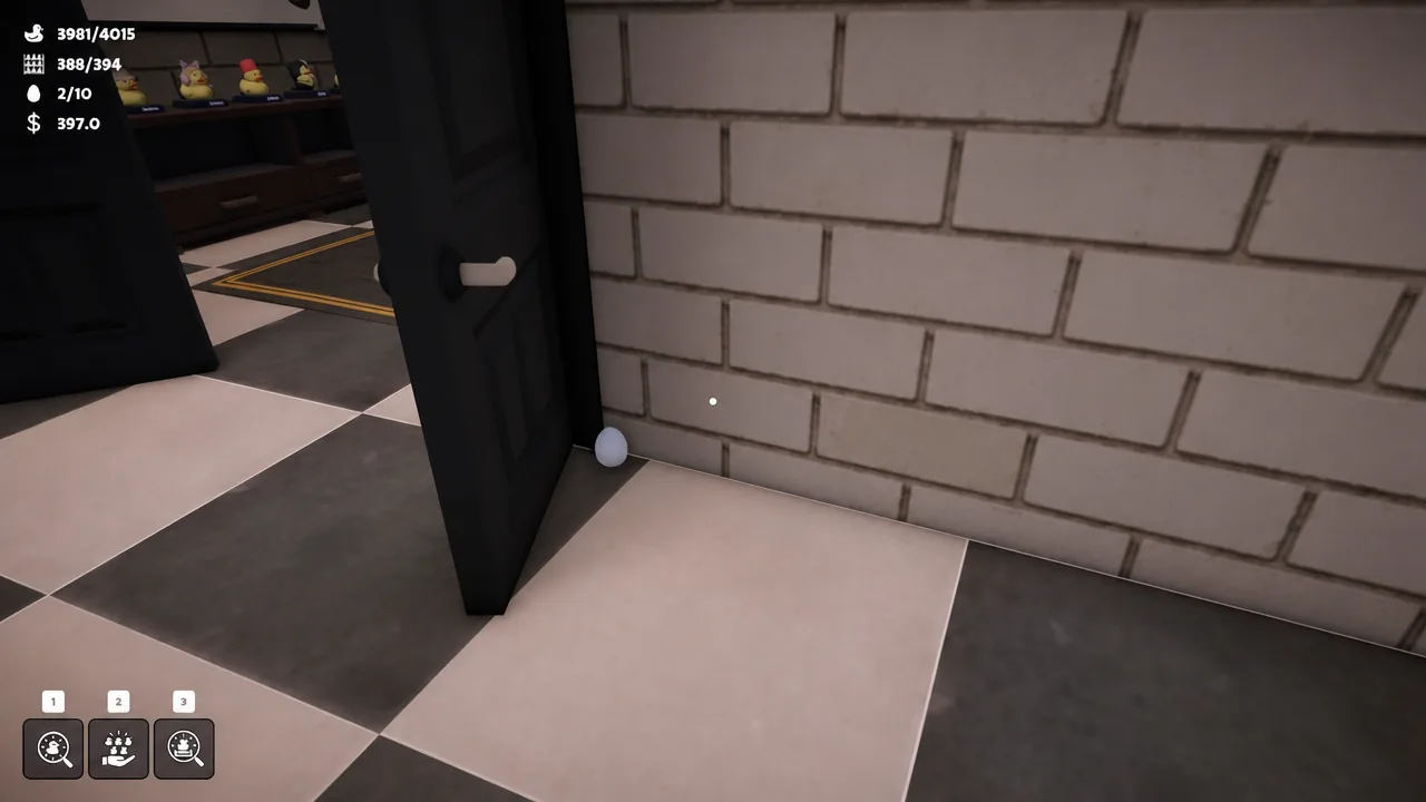 Open black office door with a small white egg on the floor at its base.