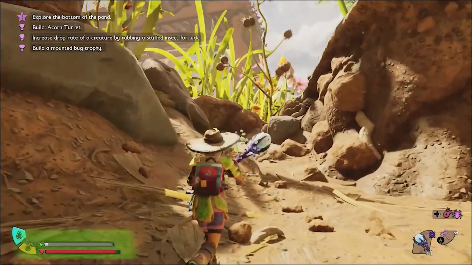 Player exploring a rocky path toward the pond with an active exploration objective
