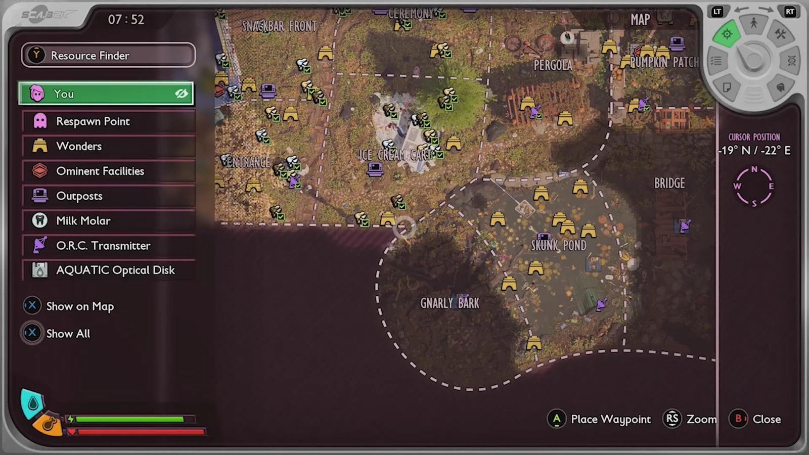World map open with a marker near the racetrack showing the cave entrance area