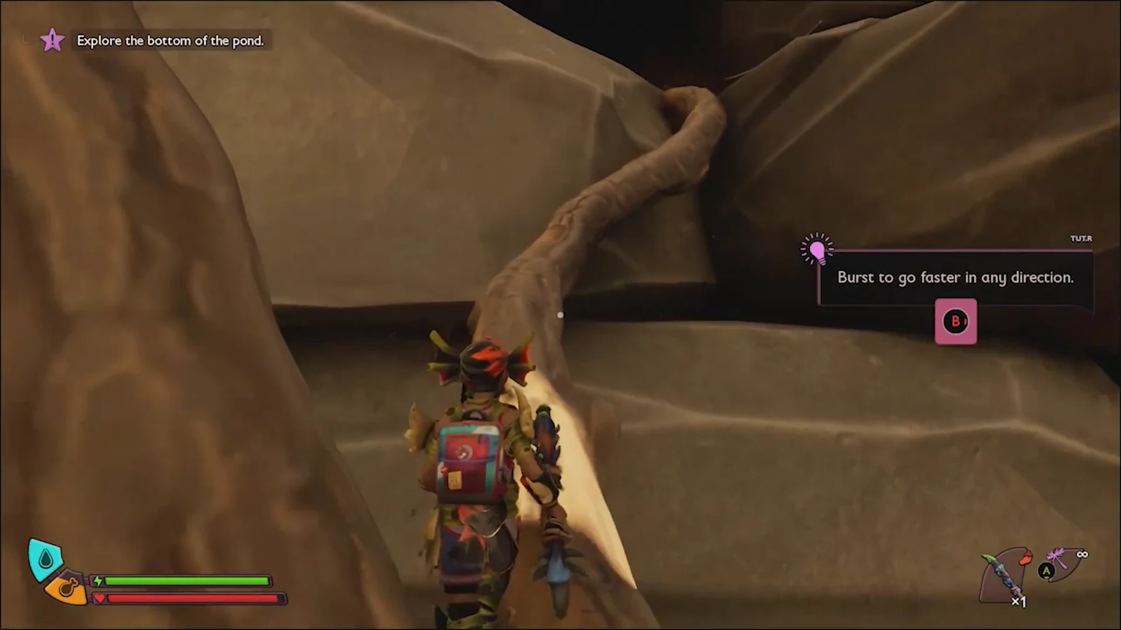 Character climbing the root into the elevated cave with the explore the bottom of the pond objective visible