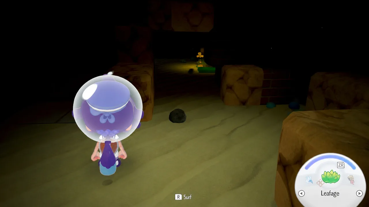 Ditto standing in front of a broken wall in the dark in Pokemon Pokopia
