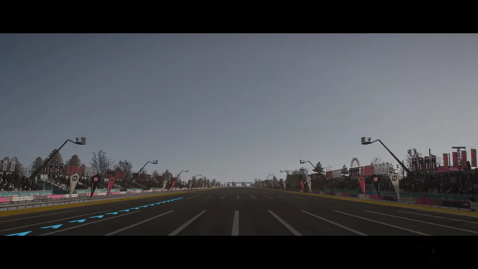 Blue racing line guiding a car down a long straight toward the next turn