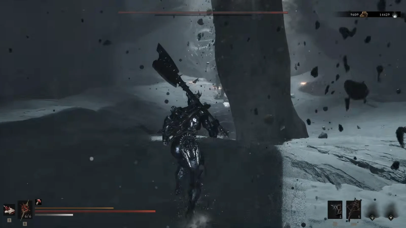 Armored character with a greatsword striking a boss inside a snow-covered arena.