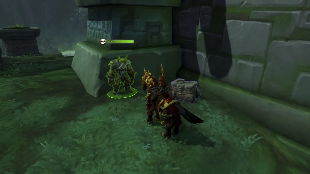 Player targeting a highlighted NPC beside an outlined treasure chest