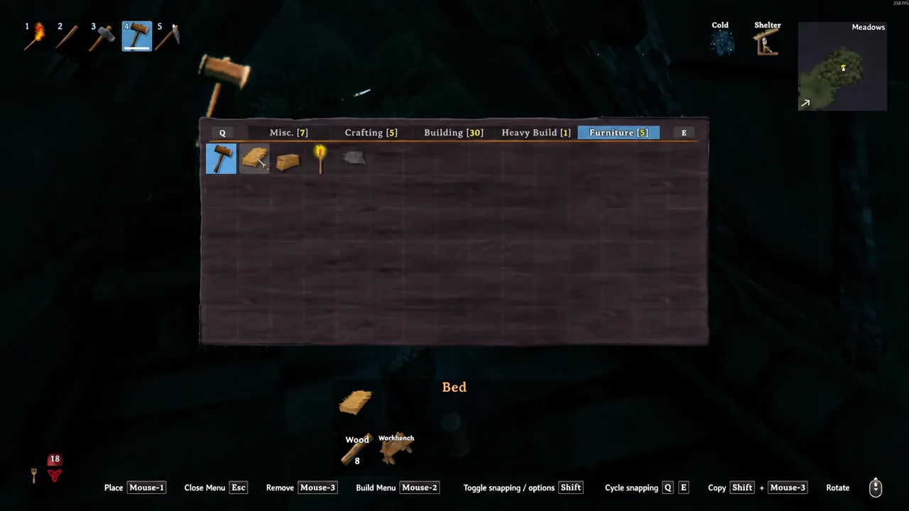 Valheim building menu on the Furniture tab with the Bed item selected for placement