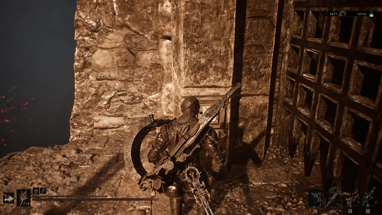 Armored player character standing in front of the closed barred gate inside the castle