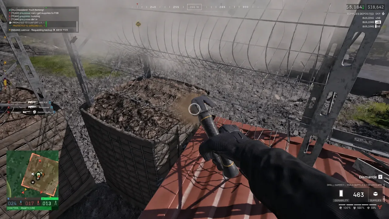 Player holds a sledgehammer to a FOB structure with the Dismantle prompt on the HUD