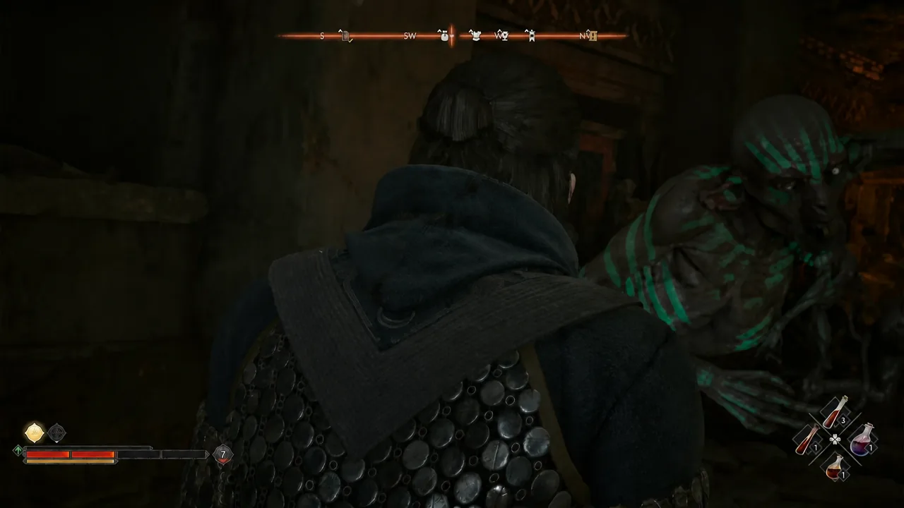 Coen fighting an undead enemy in the lower halls of the ancient ruins