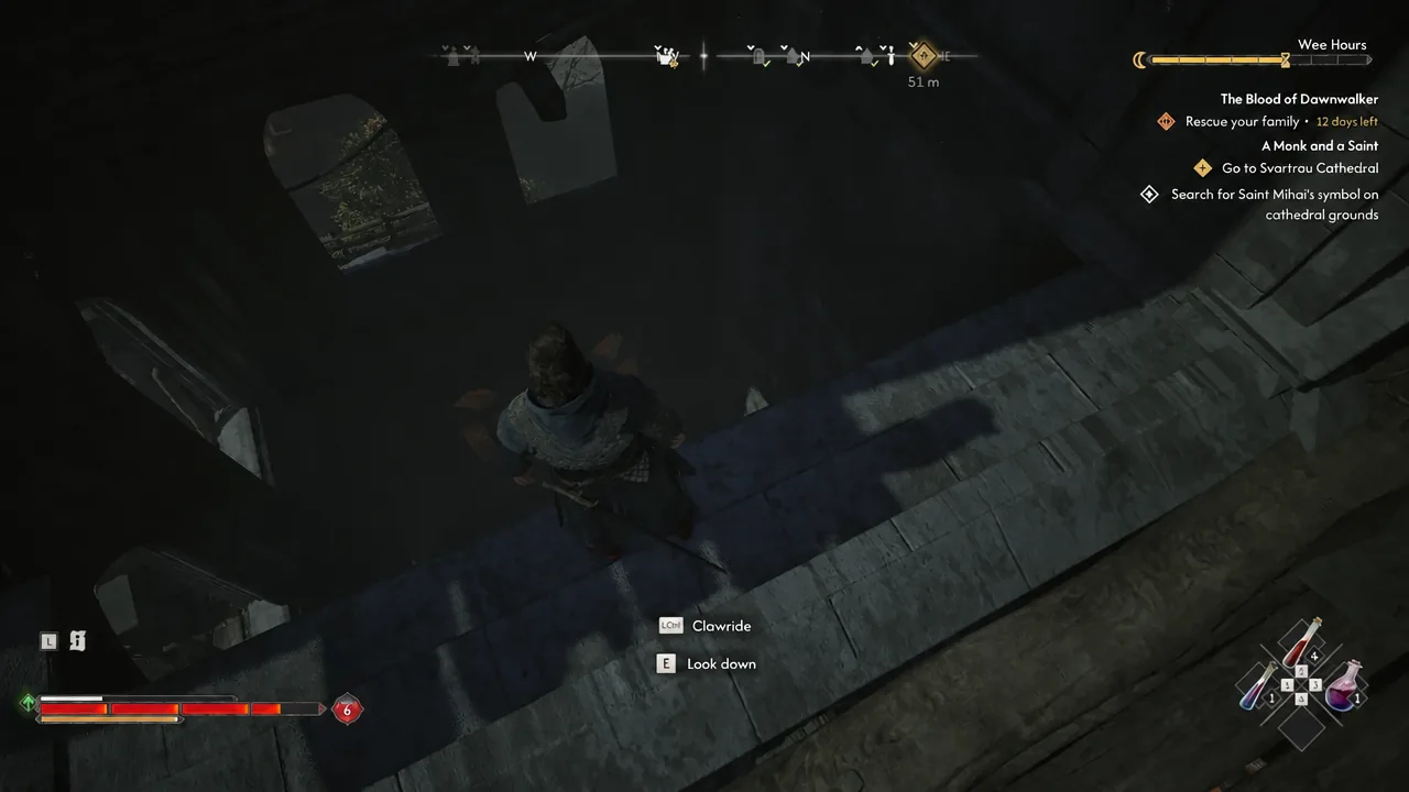 Coen at a cathedral ledge with the E Look down prompt on screen