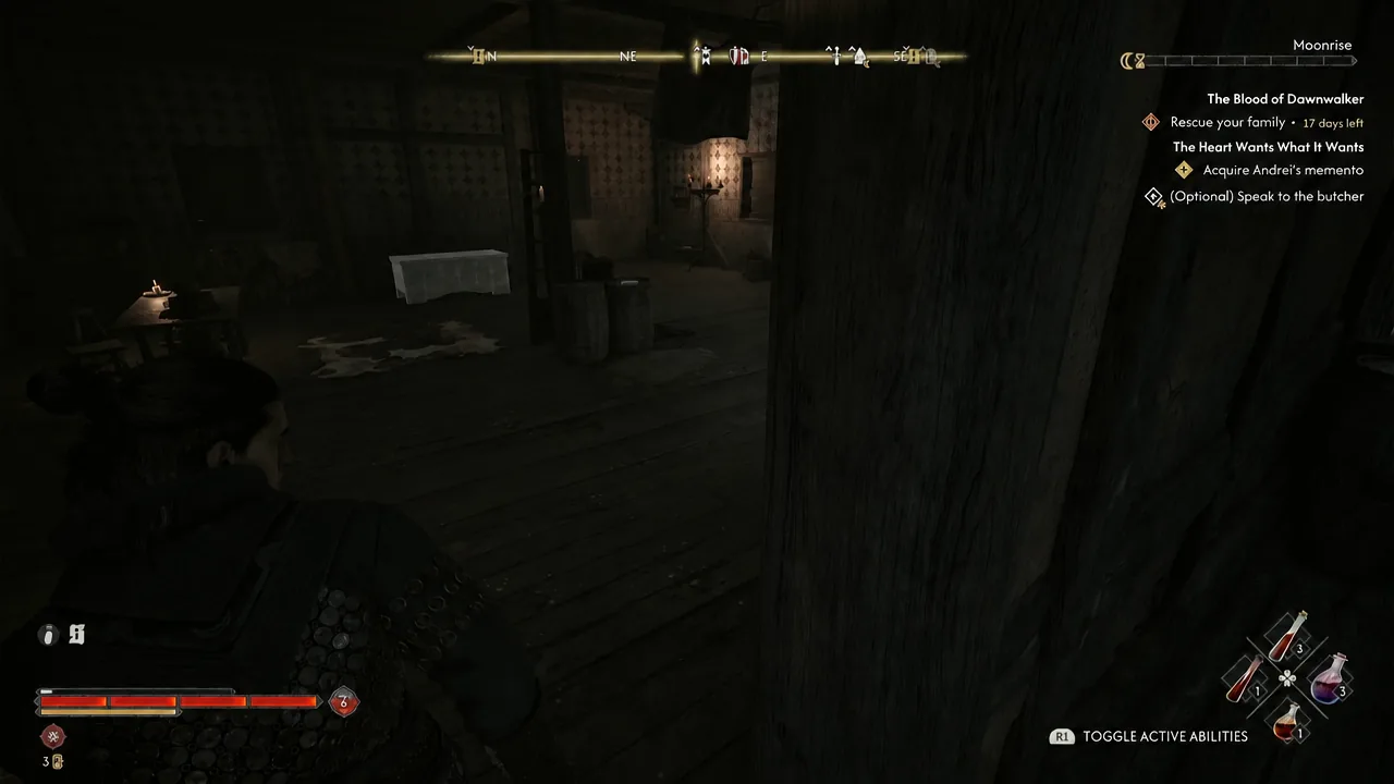 Coen moving through the dark interior of Andrei's room with the quest tracker on screen