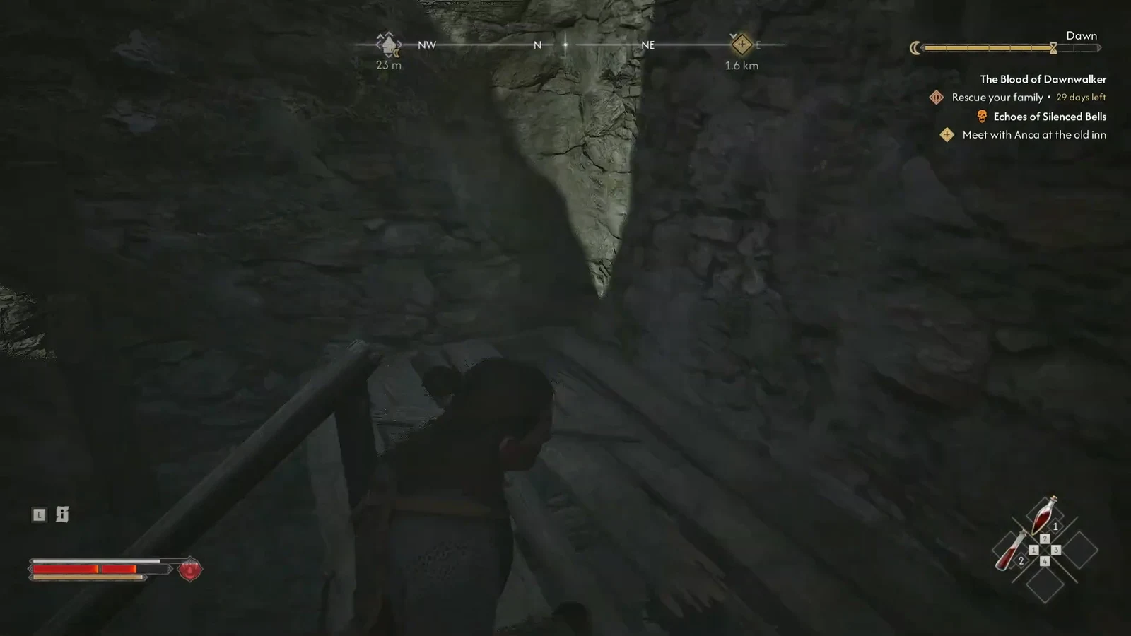 Dark rocky interior passage with the Blood of Dawnwalker objective list shown in the upper right