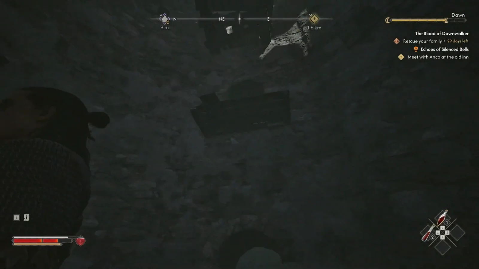 Coen moves through a dark passage with the objective marker tracked in the corner of the screen