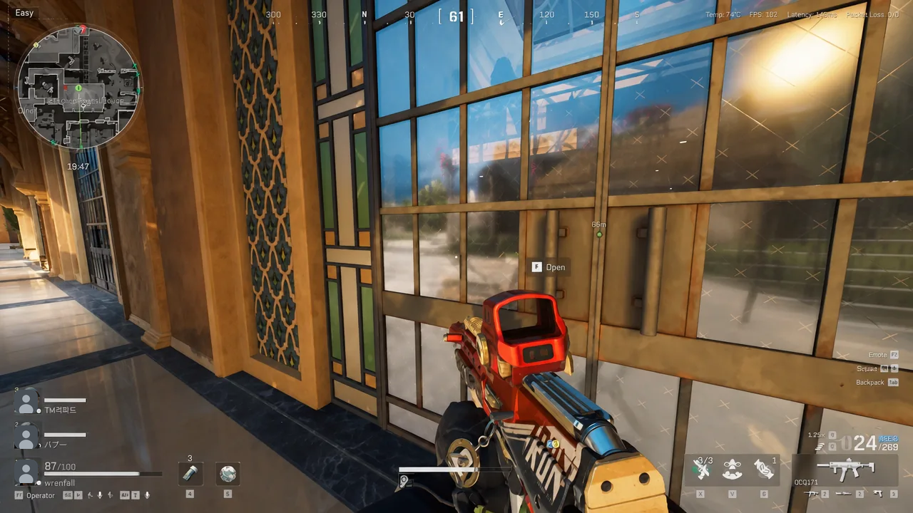 The F Open prompt appears on a closed double door as the player aims at it