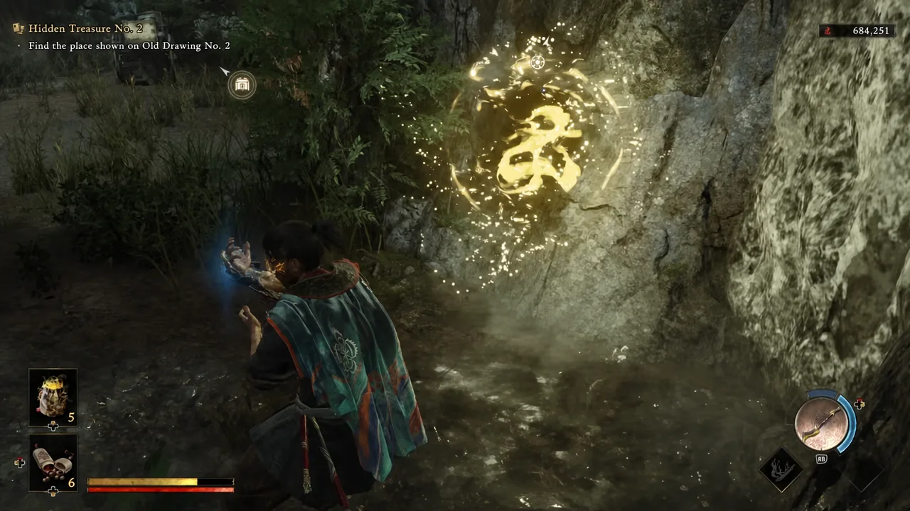 Player using the Oni Gauntlet on a glowing marker at the rock face for Hidden Treasure No. 2