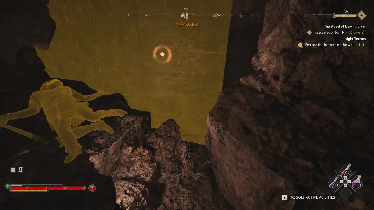 Highlighted corpse at the bottom of the well holding the Thief's Note
