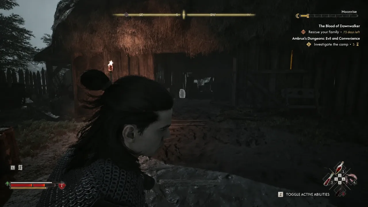 Coen crosses the outpost grounds with the camp investigation objective on screen