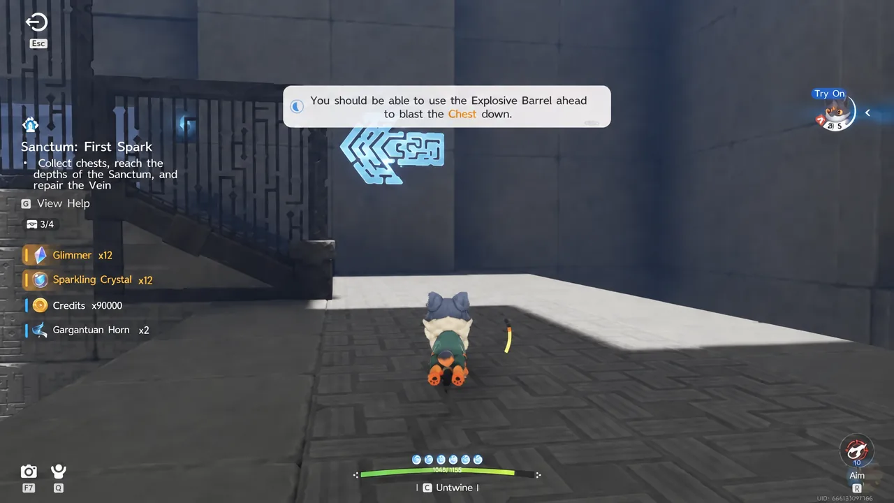 On-screen prompt telling the player to use the explosive barrel ahead to blast a chest down