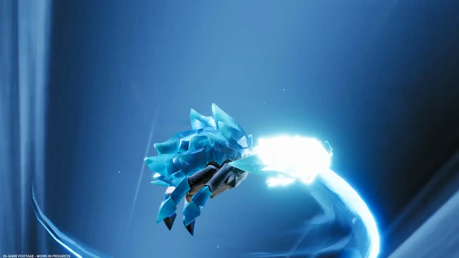 A blue crystalline creature fires a glowing beam through a dark blue cavern or arena.