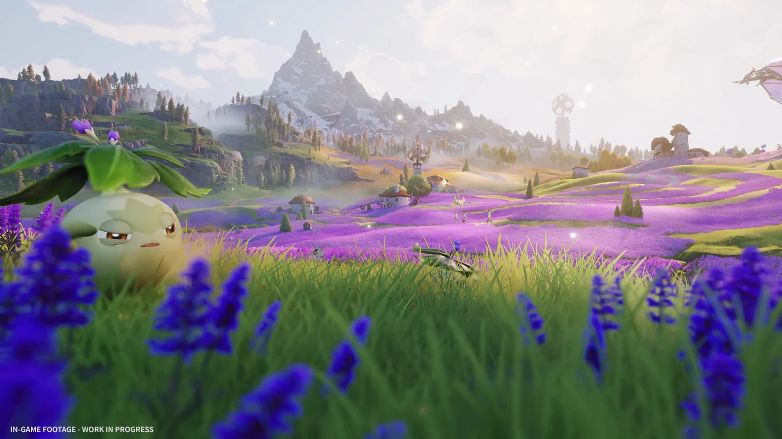 A small round creature sits in purple flowers across a vast sunlit valley with distant mountains and a tower.