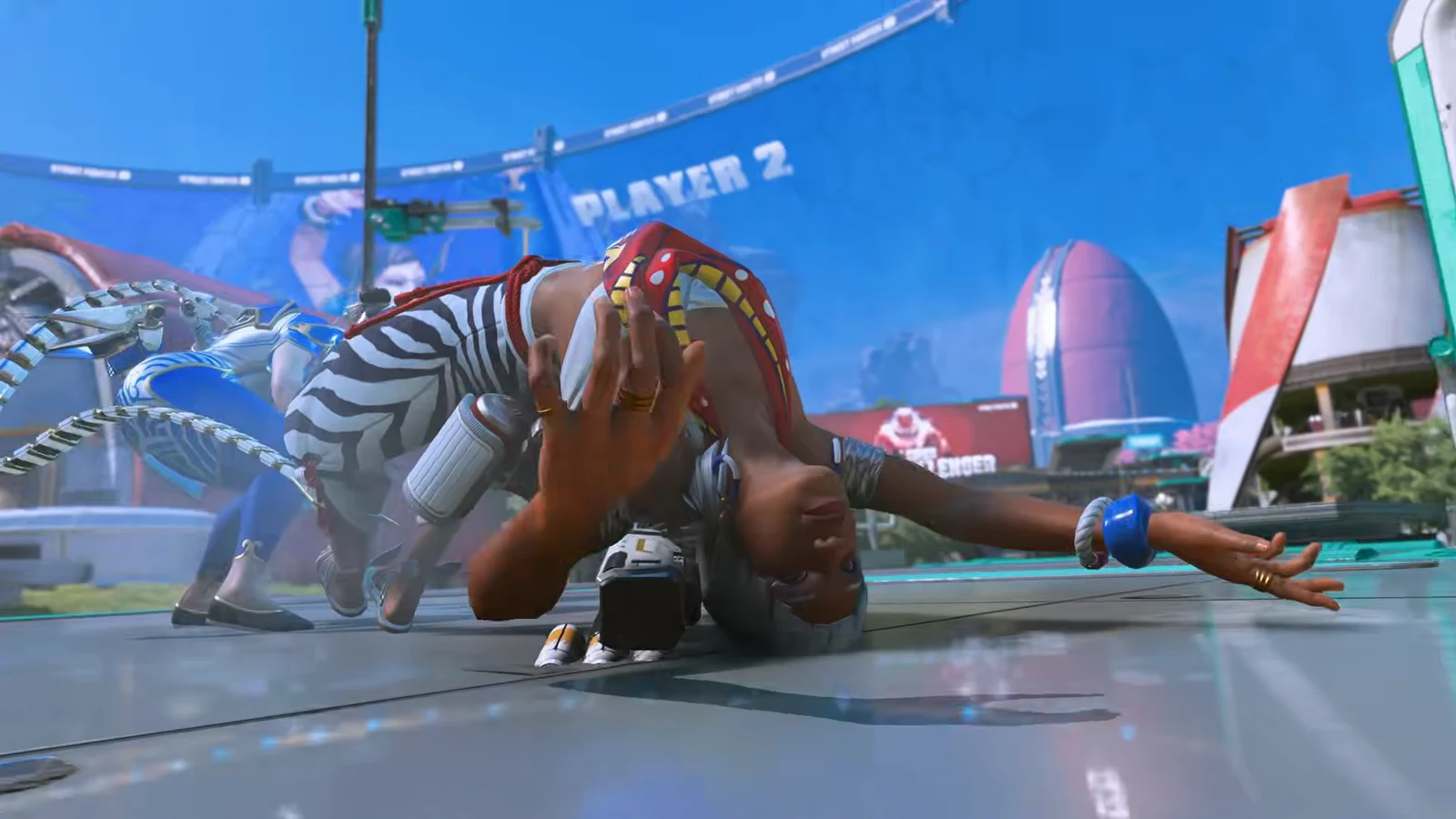 Red truck branded with the Street Fighter 6 logo being smashed by the Luke skin