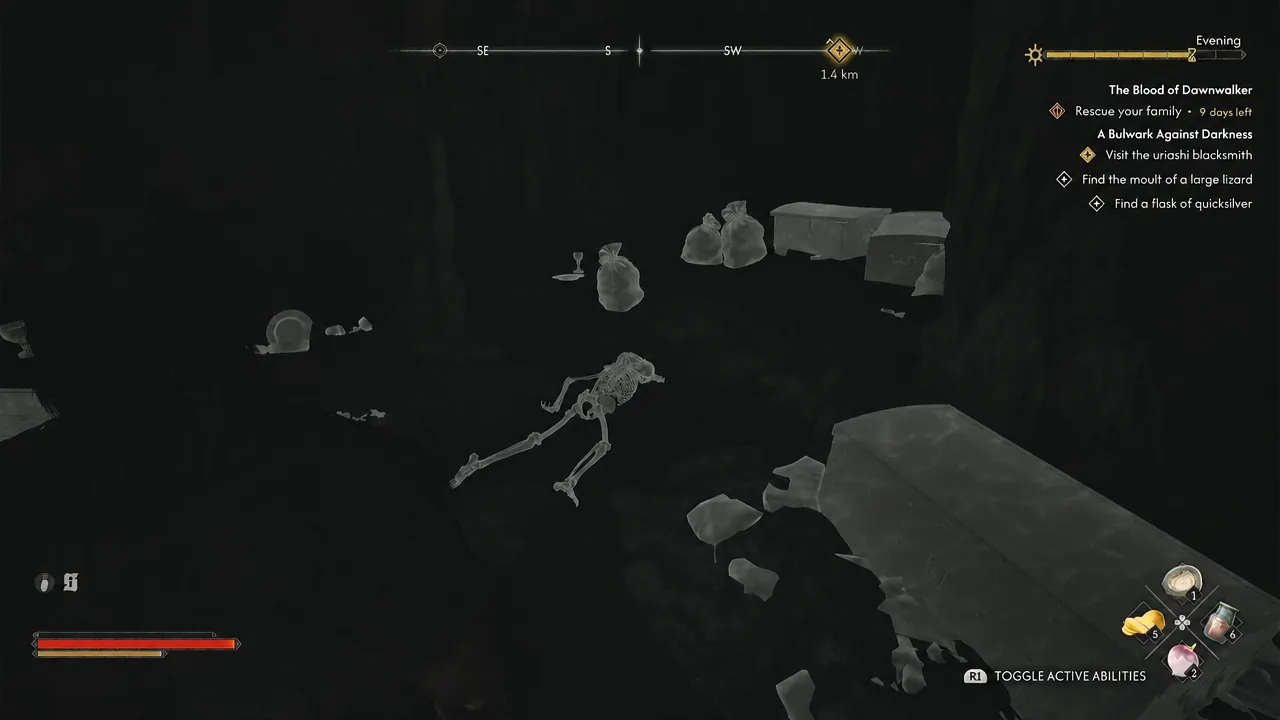 Looting the skeleton on the cave floor to pick up the Arbiter's Medallion
