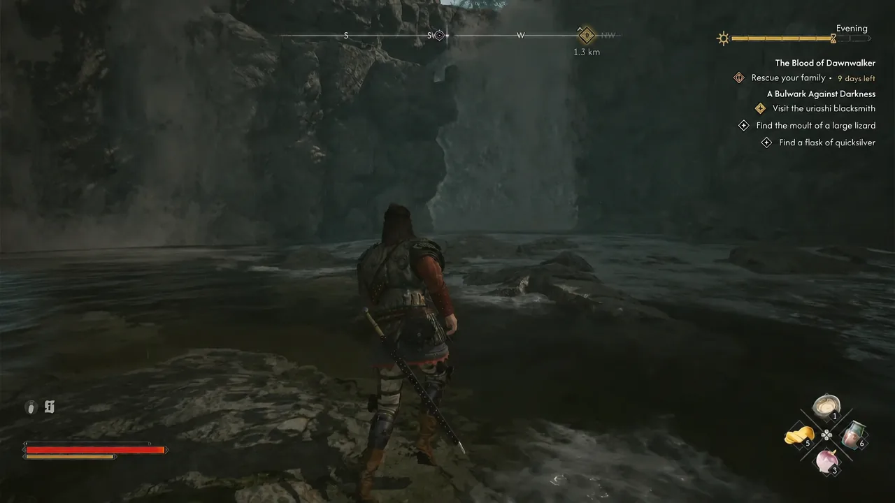 Character wading through the flooded cave behind the waterfall with the quest tracker on screen