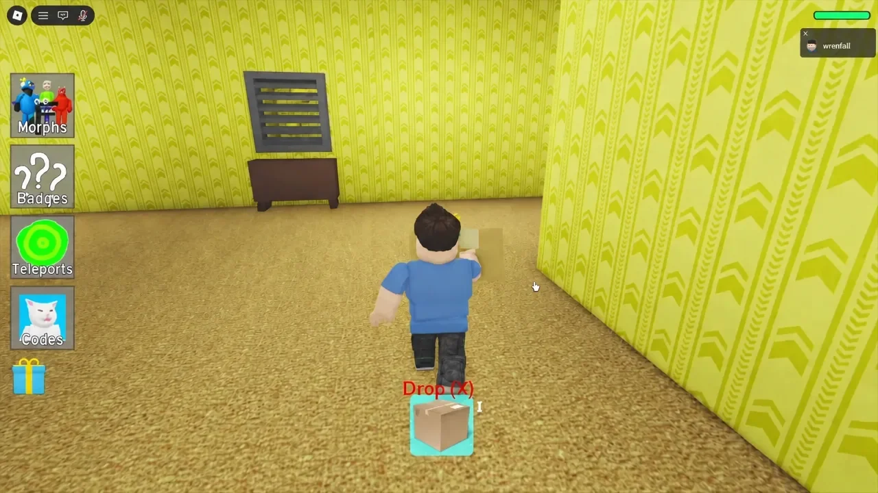 Player carrying the Box tool with the Drop (X) prompt visible on screen