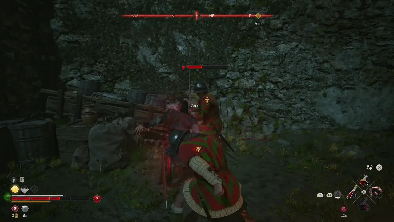 Coen attacking a red-robed guard with the enemy health bar shown at the top of the screen