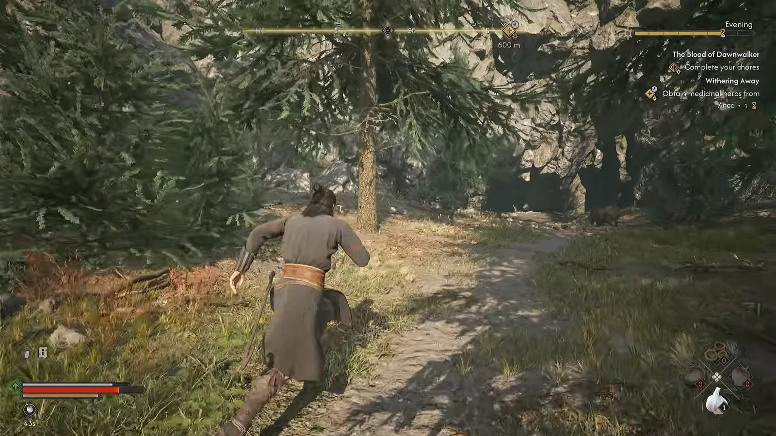 Coen walking through dense woodland east of Laslea Glen with a quest objective tracked on screen