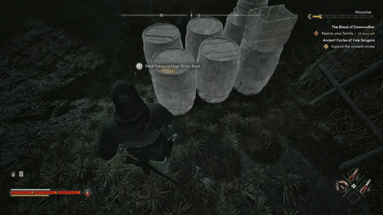 Steal prompt for the treasure map appears over a stack of highlighted barrels in the bandit camp