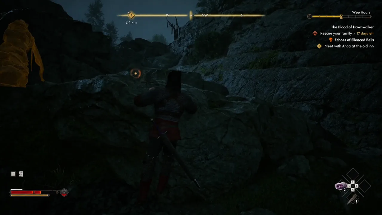 Coen climbing the marked mountain path with the quest tracker and distance marker on screen