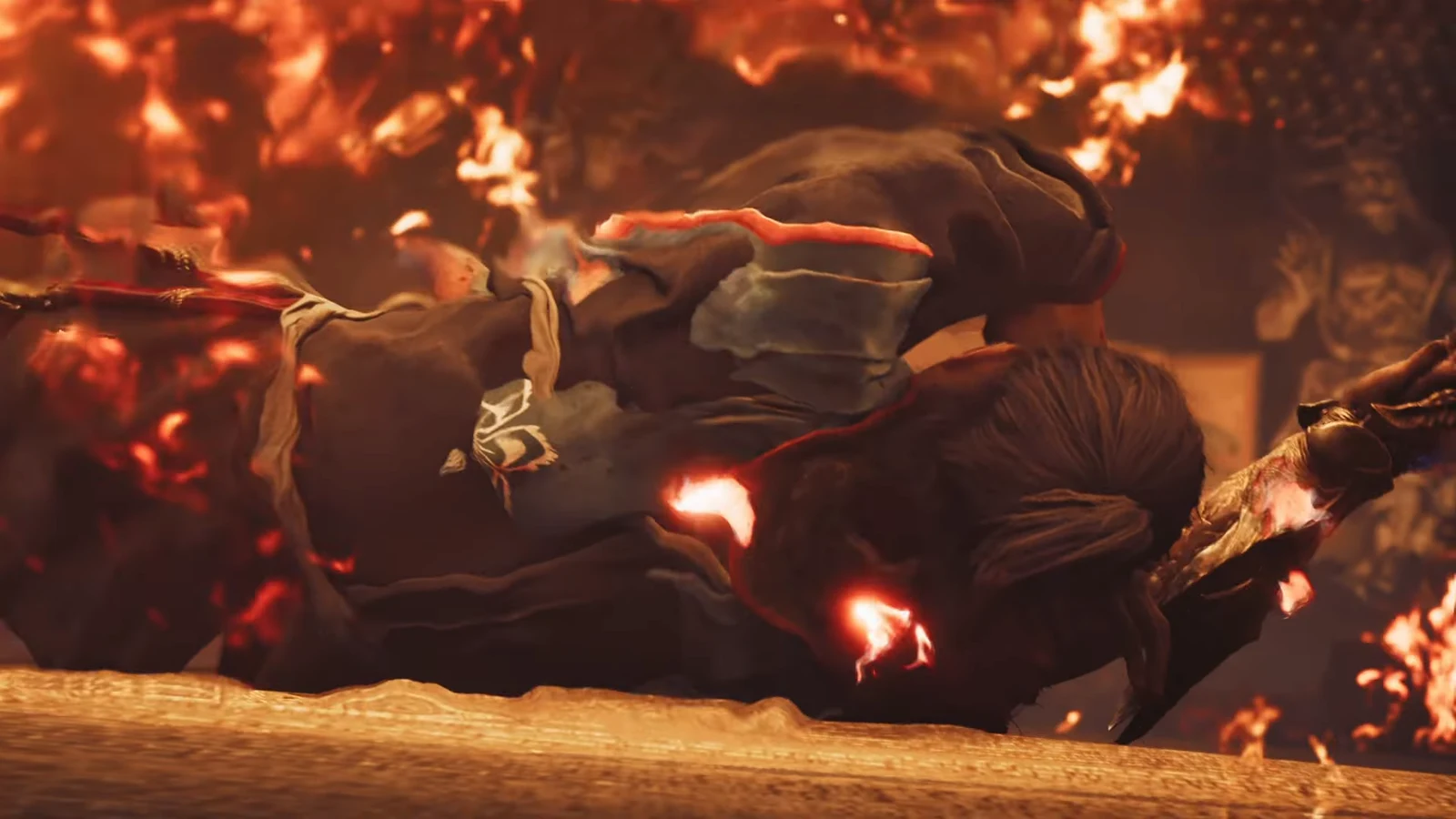 The decapitation cutscene leads straight into phase two, with the burning head floating free of the body.