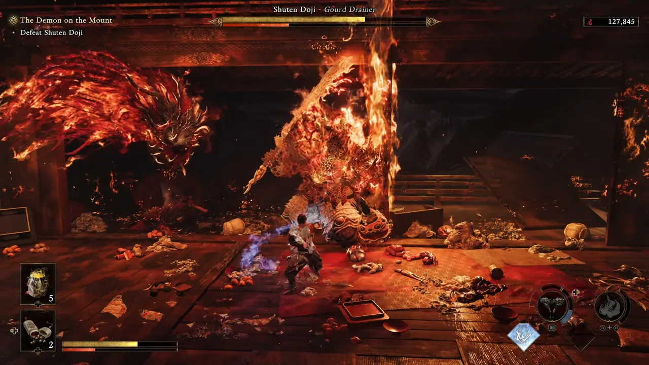 Shuten Doji's boss health bar highlighted as Musashi presses the attack in the temple hall