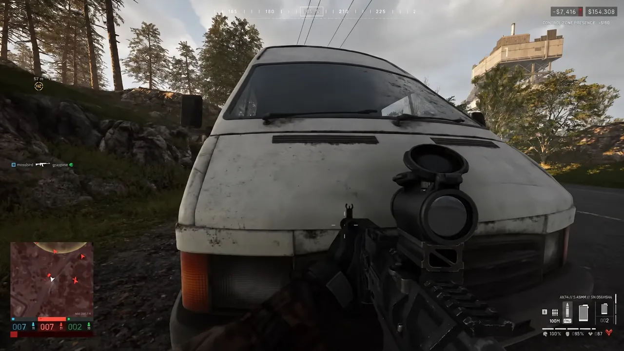 Player aiming a rifle from behind a white vehicle while holding cover near a Control Zone in WARDOGS