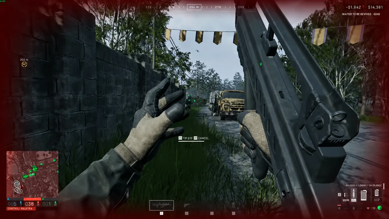 The TIP $10 prompt shown on screen during first-person gameplay