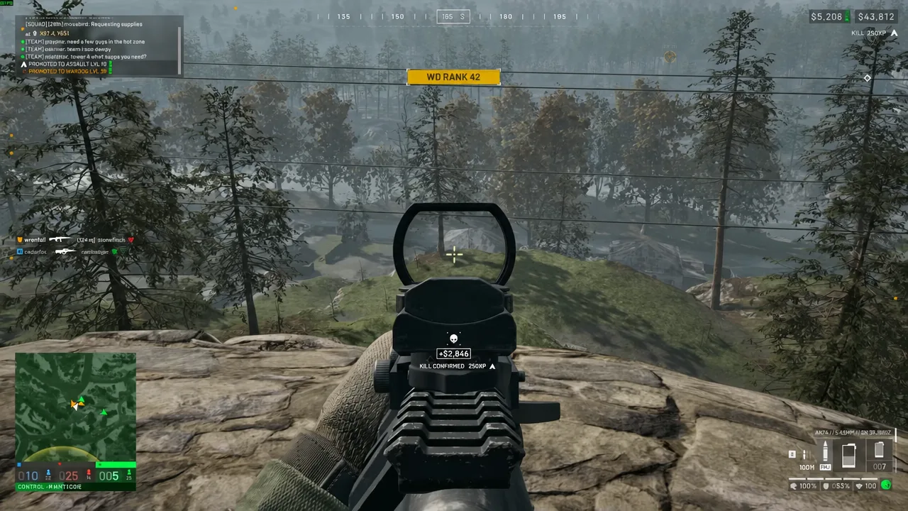 Rifle aimed down sights as a KILL CONFIRMED 250XP notification appears on the WARDOGS HUD