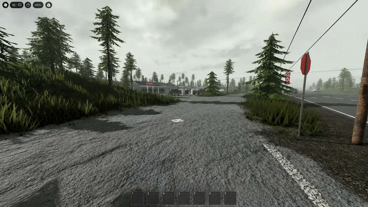 Player walking a gravel road toward an abandoned gas station with the hotbar visible