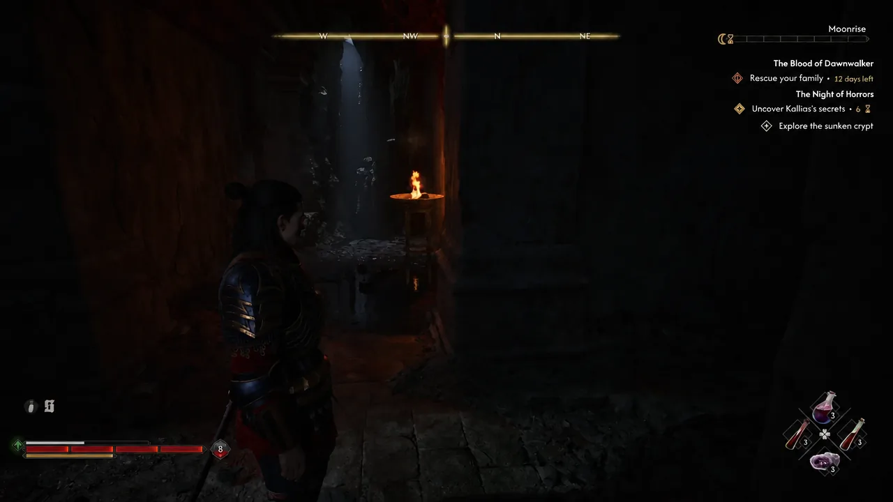 Torch-lit crypt corridor with the Explore the sunken crypt objective active