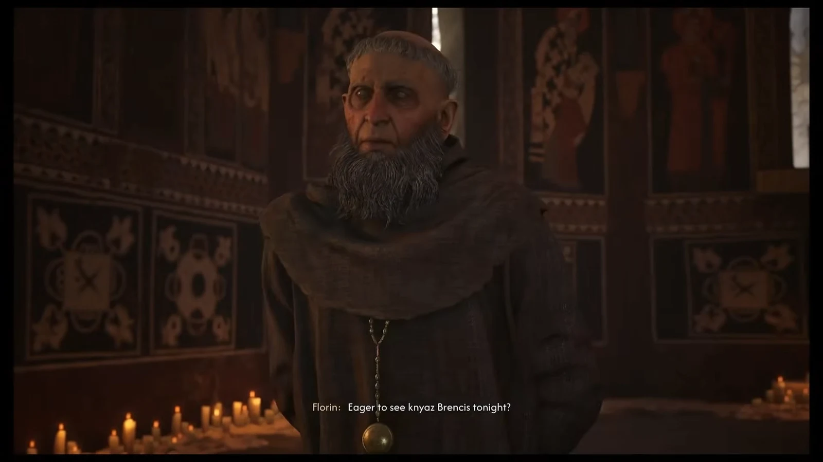 Coen speaking with Father Florin beside the altar inside the chapel