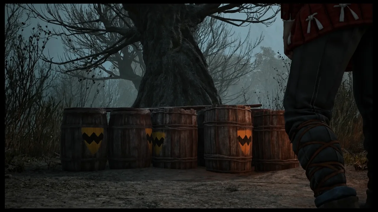 Coen standing beside a row of marked wooden leech barrels, ready to interact with them