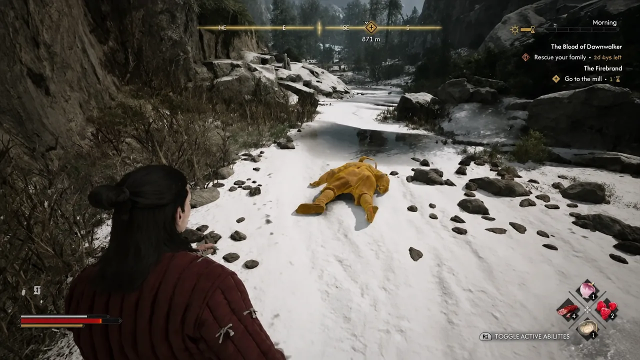 Highlighted body lying on the snowy riverbed at the end of the trail