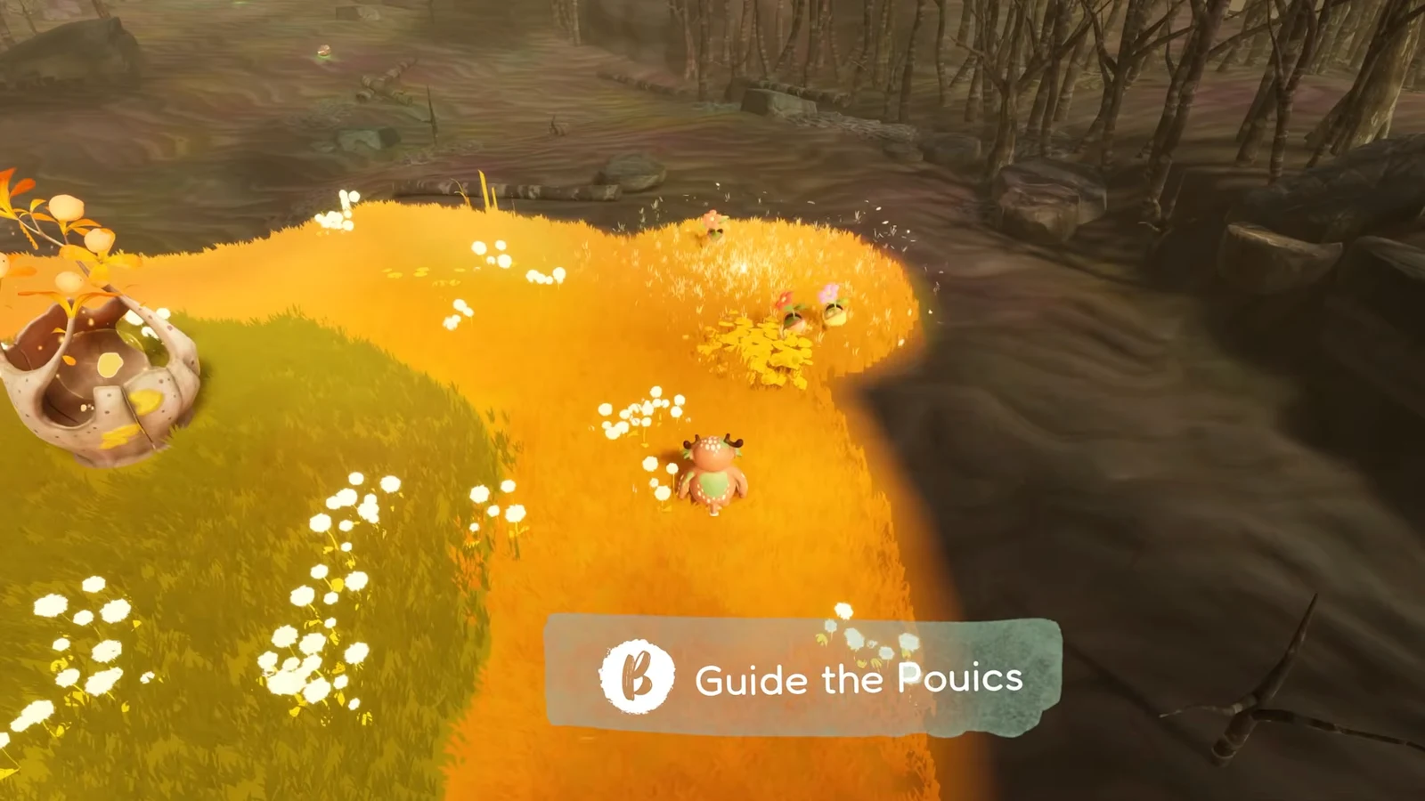 The Guide the Pouics prompt on screen as the player starts herding creatures across the field